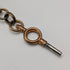 Antique British rolled gold double Albert chain with brass key fob
